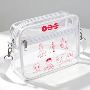 May include: Transparent crossbody bag with a white strap and zip. The bag has red illustrations of faces and figures, and the word "HOPE". The bag is rectangular and made of clear plastic.