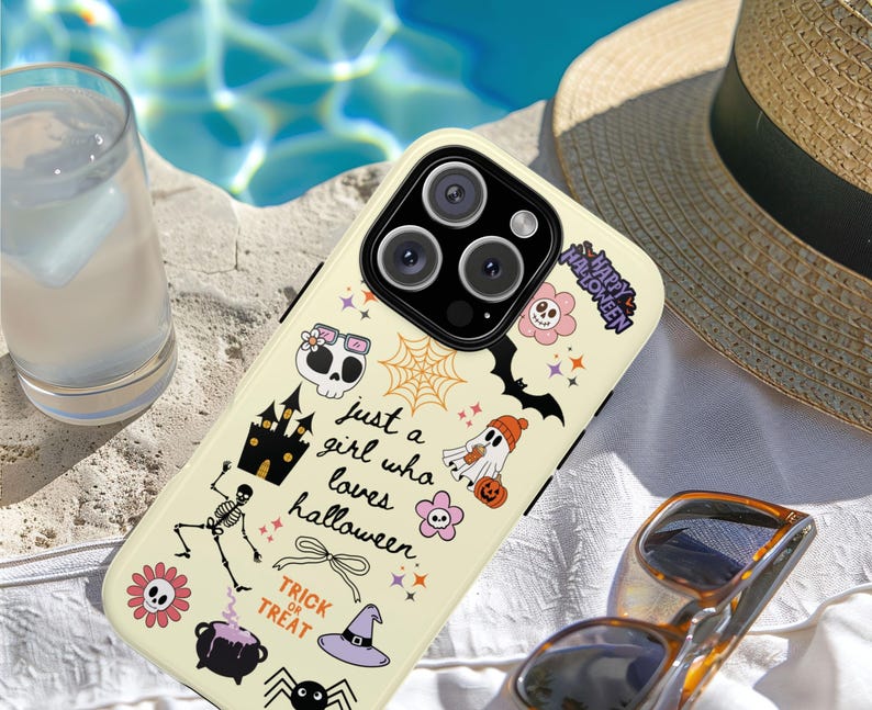 Protective Phone Cover Halloween Theme Kawaii Style Design Ghost Pumpkin Pattern Pastel Cute Girly Shell Construction Witch Hat Detail Multiple Device Compatible Beautiful Pastel Colors Fall Season Collection Essential Accessory Perfect