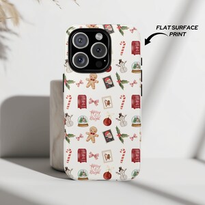 Holiday phone case for iPhone 14 and Samsung S25 featuring gingerbread, candy canes, and Merry & Bright text