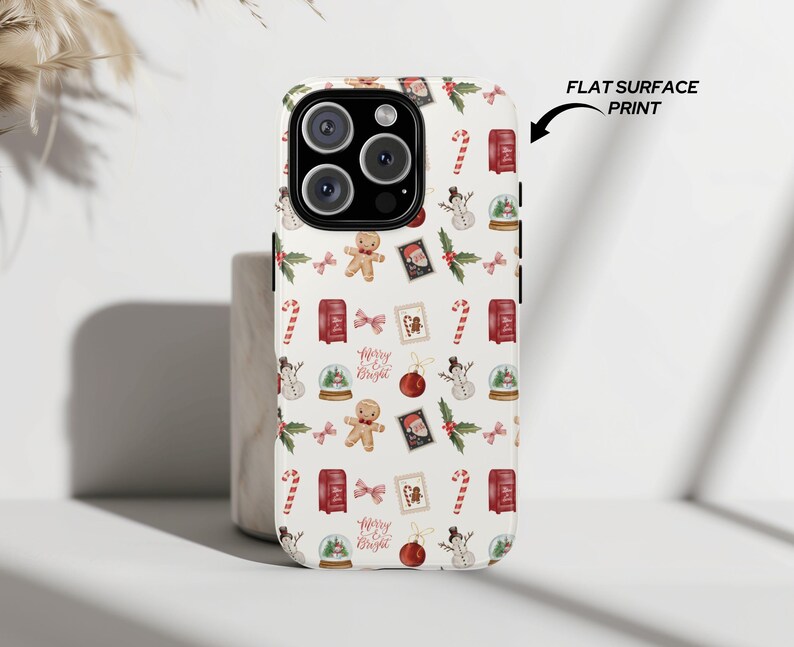 Holiday phone case for iPhone 14 and Samsung S25 featuring gingerbread, candy canes, and Merry & Bright text