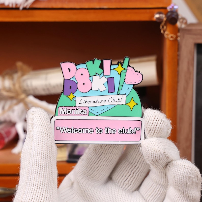 DDLC anime enamel pin set displayed on a decorative board, showcasing the glossy enamel finish and detailed character design. These pins are inspired by the popular visual novel Doki Doki Literature Club and are perfect for fans of galgames, anime aesthetics, and kawaii accessories. Whether used for Halloween cosplay, Christmas holiday gifts, or everyday ita bag fashion, these character pins offer great collectible value for Etsy buyers and anime collectors.
