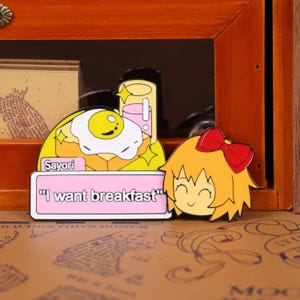 Doki Doki Literature Club enamel pin set featuring anime-style character badges of Sayori, Natsuki, Yuri, and Monika. These kawaii enamel pins are perfect for fans of visual novels, anime gifts, and collectible pin accessories. Ideal for decorating ita bags, backpacks, jackets, and cosplay outfits, these DDLC-inspired pins also make great Christmas stocking stuffers, Halloween costume decor, or cute holiday gifts for gamers and anime lovers. Crafted in high-quality metal with enamel paint finish