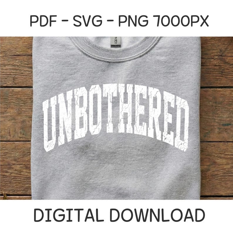 Puede incluir: Una sudadera gris jaspeada con la palabra "UNBOTHERED" en letras blancas desgastadas en el pecho. Las palabras "PDF - SVG - PNG 7000PX" y "DIGITAL DOWNLOAD" est&aacute;n impresas arriba y abajo.