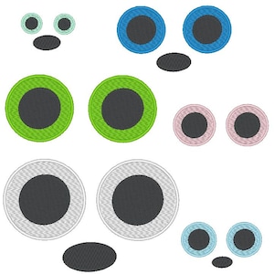 Peut inclure: Une collection de motifs d'yeux brodés de différentes couleurs. Les yeux comprennent du bleu clair, du bleu, du vert, du rose et du gris, chacun avec un centre noir. Les motifs sont circulaires avec une texture cousue, et certains ensembles comprennent une forme ovale noire en dessous.
