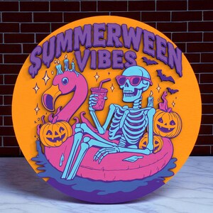 May include: Round orange sign with the text "Summerween Vibes". A skeleton wearing sunglasses relaxes on a pink inflatable ring with a flamingo and two jack-o'-lanterns. Bats and stars are also featured.