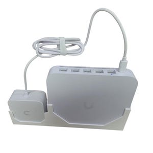May include: A white router with a power adapter and a white cable. The router has five ethernet ports and a USB port. The router is sitting on a white stand.