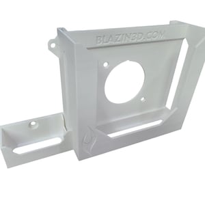 May include: White plastic wall mount with a circular cutout and a small shelf. The mount has the text "BLAZIN3D.COM" printed on it.