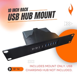 May include: A black 10 inch rack USB hub mount with a rectangular faceplate featuring cutouts for multiple USB ports. The text 10 INCH RACK USB HUB MOUNT is visible above, and INCLUDES MOUNT ONLY. USB CHARGING HUB NOT INCLUDED. is printed below.