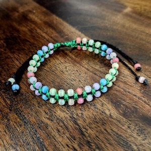 Adjustable woven and beaded bracelet