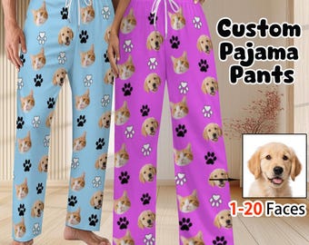 May include: Light blue and purple pajama pants with a repeating pattern of cat and dog faces, along with paw prints. The text "Custom Pajama Pants" is visible. The pants have a drawstring waist and are designed to accommodate 1-20 faces.