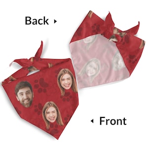 May include: Red pet bandana with a custom face print and paw prints. The front of the bandana features multiple faces and paw prints, while the back has a lighter print of faces. The bandana is tied at the top.
