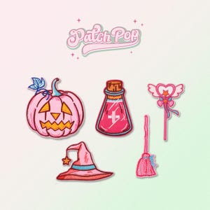 May include: Set of six pink and blue embroidered iron-on patches featuring a pumpkin, potion bottle, witch hat, broom, wand, and wings. The patches are labelled "Patch Pop".