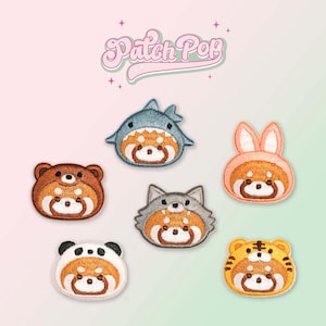 May include: Set of seven embroidered iron-on patches featuring red pandas wearing different animal costumes. The costumes include a shark, bunny, bear, wolf, panda, and tiger. The patches are all in different colors and have a cute and playful design.