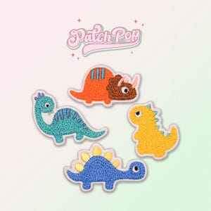 May include: Set of four embroidered iron-on patches featuring different dinosaurs in various colors, including blue, green, orange, and yellow. The patches are designed with a cute, cartoon-like style. The text "Patch Pop" is visible at the top of the image.