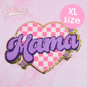 May include: An XL size heart-shaped patch with the word "Mama" in purple script. The patch has a pink and white checkered pattern and gold glitter accents. The brand name "Patch Pop" is in the upper left corner.