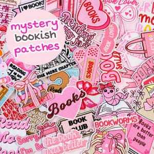 May include: A collection of embroidered patches featuring pink and red colour schemes with book-themed designs and text including "Books," "Reading is my jam," "Book Club," "One more chapter," "Bookworms," and "Books are better than people."