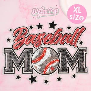 May include: A pink patch with the words "Baseball MOM" in a sequined design. The word "Baseball" is in red script, and "MOM" is in gray block letters. A baseball graphic is in the center, and black stars surround the text. The patch is labeled "XL size".