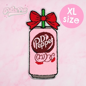 May include: Pink XL size patch in the shape of a Dr. Pepper soda can with a red bow on top. The Dr. Pepper logo is in a dark brown oval. The patch has a silver border and the text "(23)" is visible.
