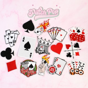 May include: A collection of embroidered patches featuring playing card themes, including suits, a royal flush, a king, dice, poker chips, and cards on fire. The text Patch Pop is visible at the top. The designs are rendered in red, black, and white.