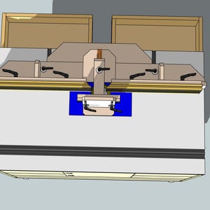 May include: Overhead view of a woodworking router table with a router bit installed and a blue base. The table has a wooden top with a groove for a fence and two wooden cabinets on either side.