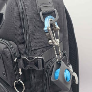 May include: A set of three ceramic mugs with a speckled, matte finish. The mugs are in shades of cream, light gray, and dark gray. Each mug has a simple, minimalist design, perfect for coffee or tea.