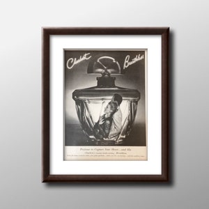 May include: A vintage black and white advertisement for Charbert's Breath less perfume. The ad features a woman inside a clear glass bottle of perfume. The text reads "Charbert's Breath less. Perfume to Capture Your Heart... and His."