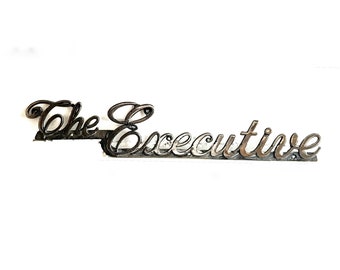 The Executive Vintage Sign Metal Emblem Chrome Silver Industrial Decor