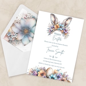 May include: Easter brunch invitation with a watercolour design. The invitation features a bunny ear and floral crown, with the words "Happy Easter." The envelope has a floral design. The invitation includes the date, time, and location.