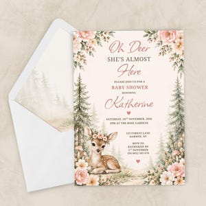 May include: A baby shower invitation card with a fawn wearing a flower crown, surrounded by pine trees and pink flowers. The text reads: Oh Deer SHE'S ALMOST Here, PLEASE JOIN US FOR A BABY SHOWER HONORING Katherine, SATURDAY, 24TH NOVEMBER, 2026.