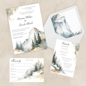 May include: Wedding stationery set with watercolour mountain and tree designs. The invitation includes the names Sienna Miller & Jacob Black, event details, and RSVP information. The set includes an envelope and details card.