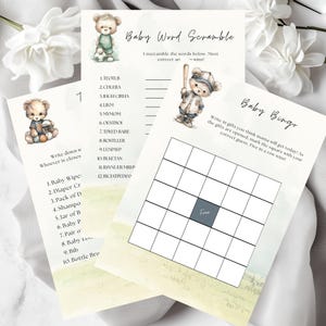 Puede incluir: Tres imprimibles de juegos para baby shower con ilustraciones de ositos de peluche en acuarela. Los juegos incluyen Baby Word Scramble, Baby Bingo y una lista de artículos para bebés. Los imprimibles tienen una paleta de colores pastel.