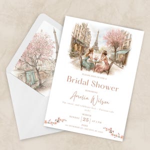 May include: Bridal shower invitation with a watercolour illustration of a Parisian cafe, including the Eiffel Tower. The invitation includes the text "Bridal Shower" and details for Amelia Wilson's celebration.