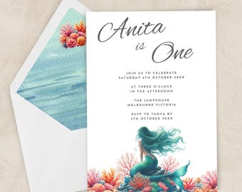 May include: A white invitation card with a mermaid illustration and the text "Anita is One". The invitation is for a birthday party on Saturday 6th October at 3:00 PM at The Jump House in Melbourne, Victoria. RSVP to Tanya by 5th October.