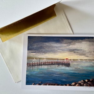 May include: A painting of a wooden pier extending into a body of water with a red roofed gazebo at the end. The water is a light blue and the sky is a dark blue with white clouds. The painting is signed in the bottom right corner.