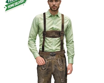 May include: A man wearing a traditional Bavarian outfit, including brown leather shorts with decorative embroidery, suspenders, and a light green button-down shirt. The outfit is completed with a belt and buckle.