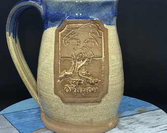 Green Dragon inspired mug, 16 ounces, blue over rust glaze