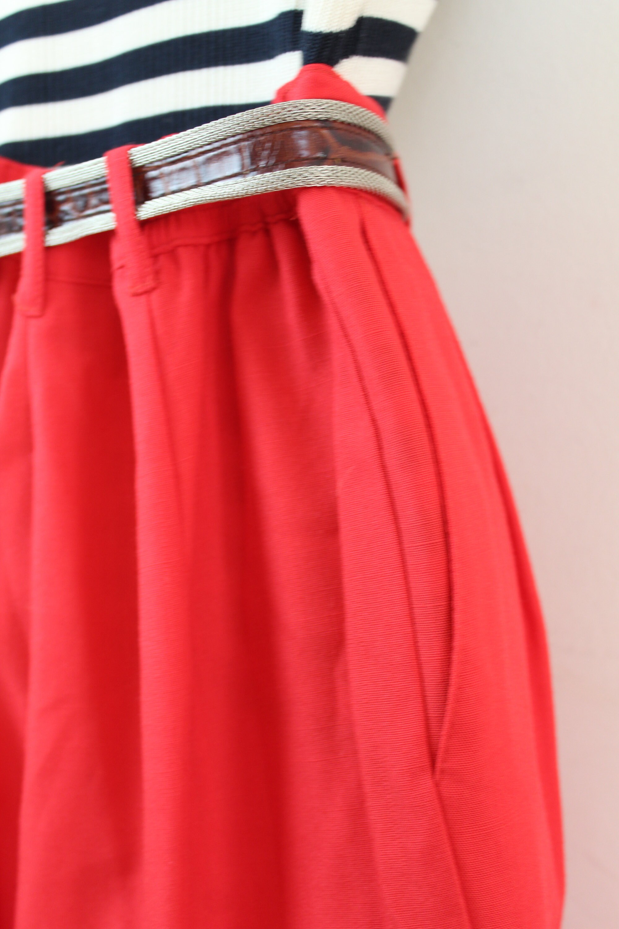 red tapered trousers