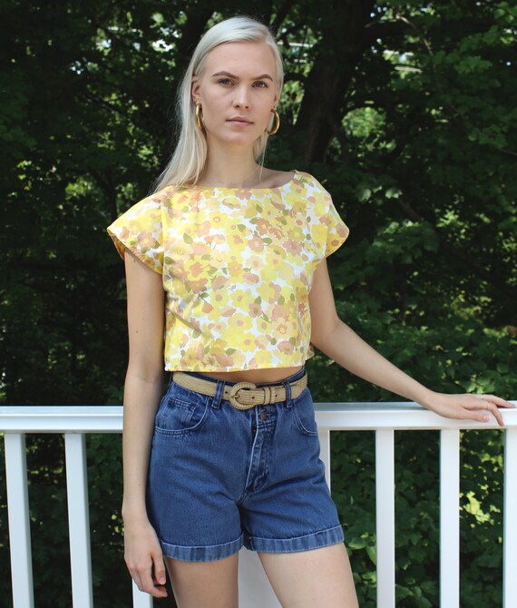 GETADME 2025 summer Korean style niche design slimming high waist cuffed denim short skirt for women anti-exposure A-line hip skirt
