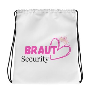Könnte beinhalten: Weißer Kordelzugbeutel mit schwarzen Kordeln. Der Beutel trägt den Text "BRAUT Security" in Pink und Schwarz, mit einem rosa Herz und Kronen-Design. Die Tasche ist wahrscheinlich für eine Hochzeitsgesellschaft.