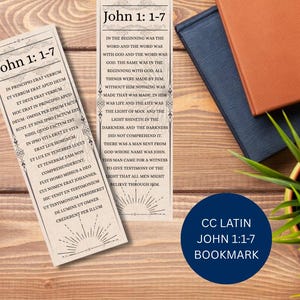 May include: Two rectangular bookmarks with text from John 1:1-7 in Latin and English. The bookmarks are cream-colored with decorative borders and sunburst designs. A navy blue circle with white text that reads "CC LATIN JOHN 1:1-7 BOOKMARK" is in the image.