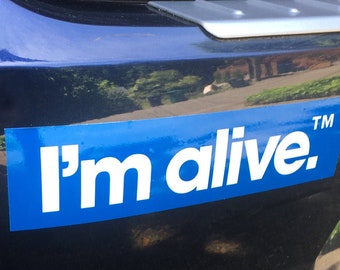 I'm alive.™  bumper sticker