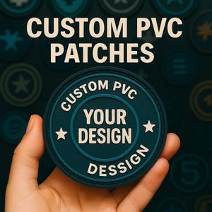 May include: A teal custom PVC patch with white text reading "CUSTOM PVC" and "YOUR DESIGN". The round patch has a star either side of "YOUR DESIGN". White text above the patch reads "CUSTOM PVC PATCHES".