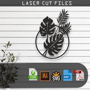 Puede incluir: Un diseño digital en blanco y negro de tres hojas tropicales en un círculo. El diseño está disponible en los formatos CDR, AI, SVG, DXF y PDF.