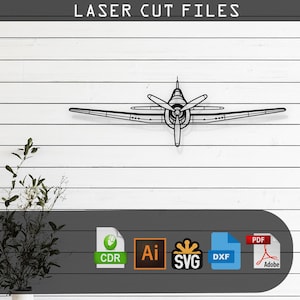 May include: Black laser-cut airplane design against a white wooden background. The text "LASER CUT FILES" is at the top. Below the plane are file format icons for CDR, AI, SVG, DXF, and PDF.