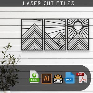 May include: Three black geometric wall art pieces featuring a mountain and sun design. The designs are in a modern minimalist style. The files are available in CDR, AI, SVG, DXF, and PDF formats.