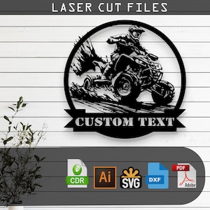May include: Black and white silhouette of a person riding a quad bike through a wooded area. The image is in a circle with the text "CUSTOM TEXT" on a banner below. The image is for laser cutting.