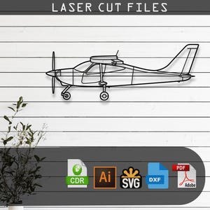 May include: A black line art illustration of a single-engine propeller airplane. The text LASER CUT FILES appears at the top. Below the airplane, icons for CDR, Ai, SVG, DXF, and PDF file formats are displayed in a horizontal row.