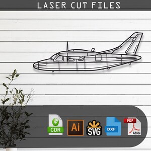 May include: A black metal wireframe outline of a twin-engine airplane. The image includes the text LASER CUT FILES at the top and icons for CDR, Ai, SVG, DXF, and PDF file formats at the bottom, indicating a digital download for cutting machines.