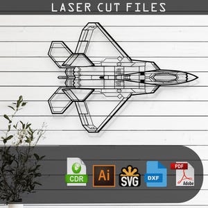 May include: A line drawing of an F-22 Raptor fighter jet, a popular military aircraft. The image is in black and white and is suitable for laser cutting. The image is labelled with the text "LASER CUT FILES" and includes icons for CDR, AI, SVG, DXF, and PDF file formats.