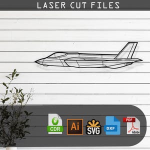 May include: A black and white line art design of a fighter jet, suitable for laser cutting. The design is available in CDR, AI, SVG, and DXF file formats.